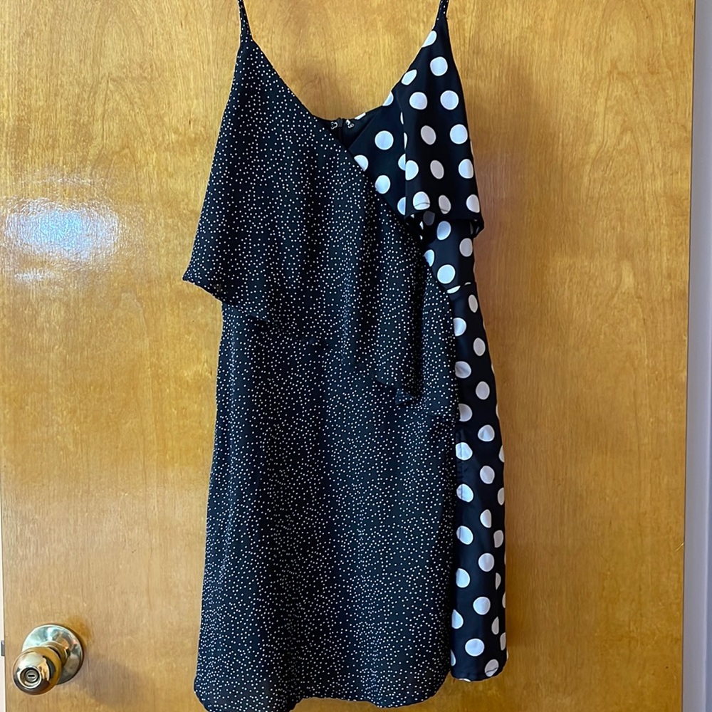 Polka dot dress with slit in the front. Size Small.